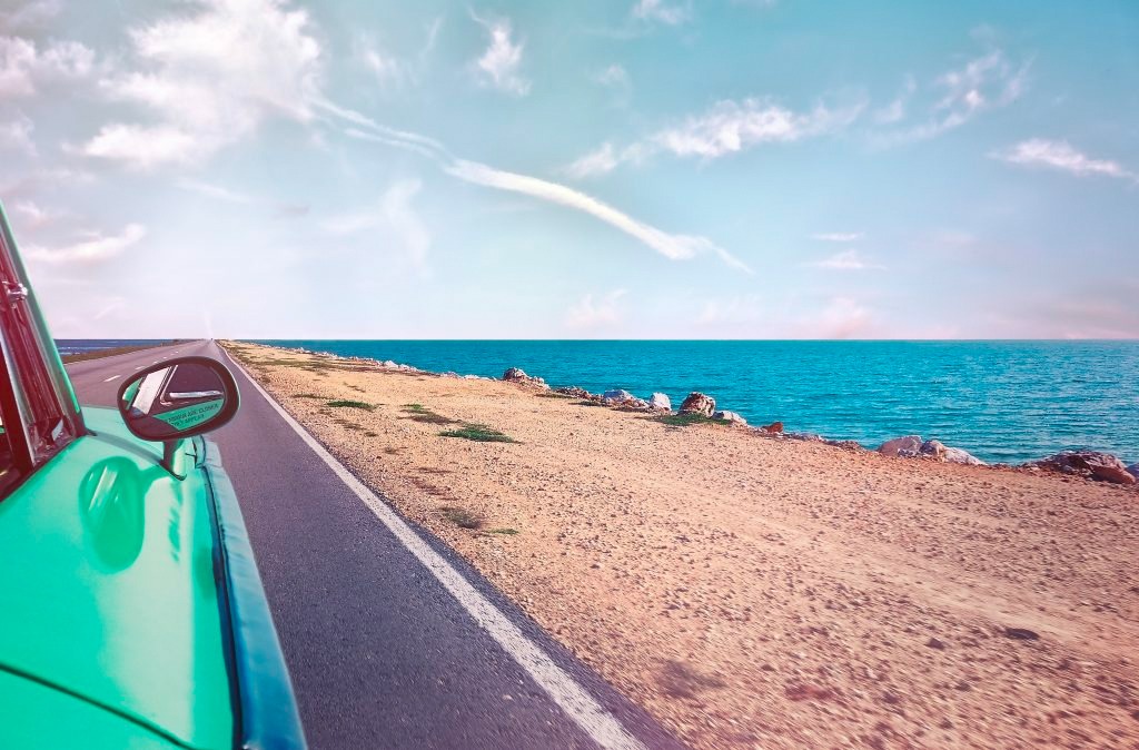 Car beach and sea