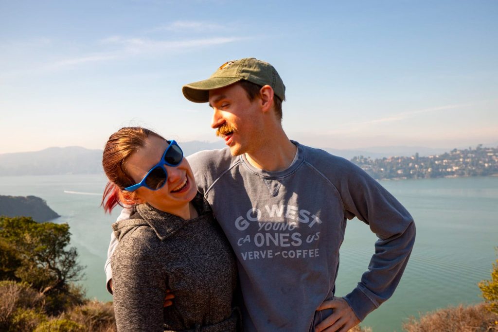 Couple with ocean behind