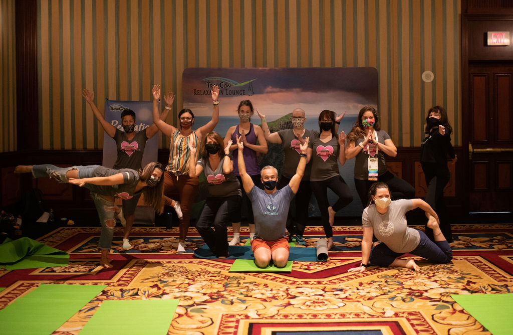 picture of people doing a yoga pose together