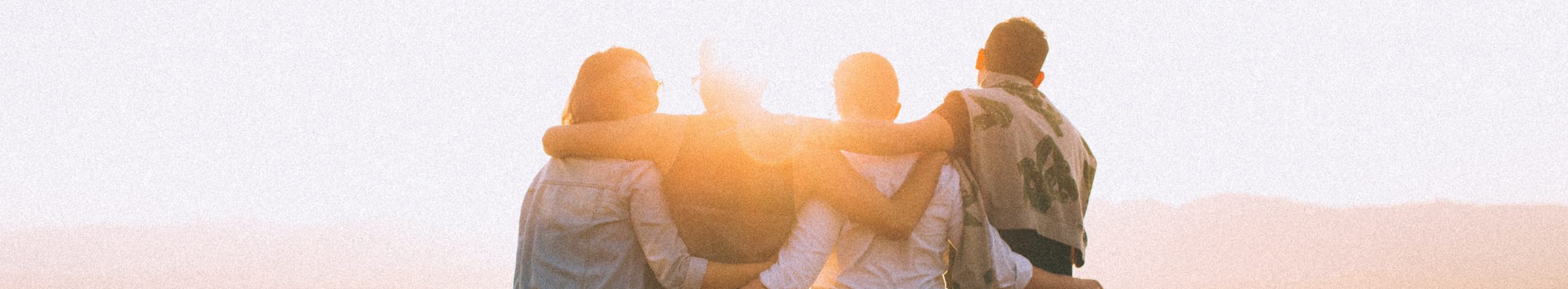 a family looking into the sun