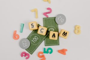 word that says "scam"